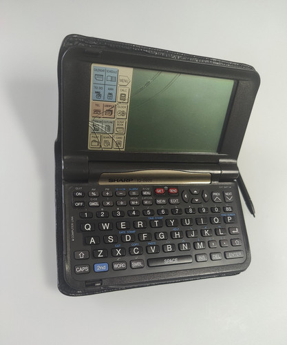 Sharp wizard 8920 pda - sharp, iq-8920